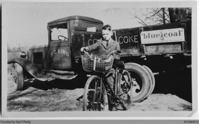 Sam King on Bicycle by S C King Coal Truck, Scotland, Ontario