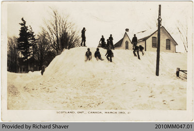 Children Playing in Snowdrift, Scotland, Ontario, 1947