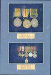 Framed medals of George Wooster and James Senn