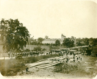 Photo of platoon marching on country road