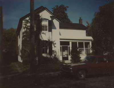 Two buildings of the 1850 white church on William St.