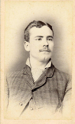 Portrait of Man in Checkered Suit