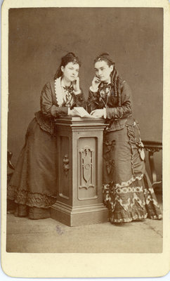 Two Young Women Posing in Symmetry