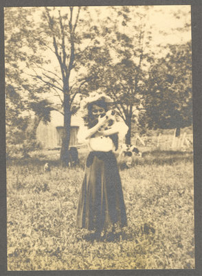 Girl Holding Kittens