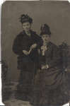 Two Women With Elaborate Hats