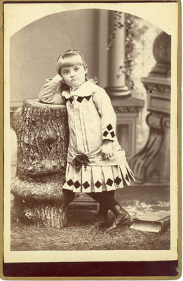 Little Girl Leaning on a Stump