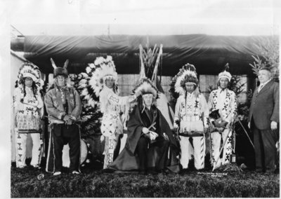 LH0391 Chief Red Dog presents R. S. McLaughlin with a headdress and names him an Honorary Chief