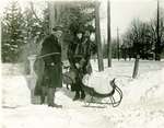 LH1333 J. Aubrey Morphy with Vera (wife) and infant son Denys in a sleigh