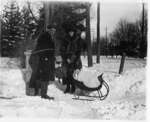 LH1422 Aubrey and Vera Morphy with son Denys on a sleigh