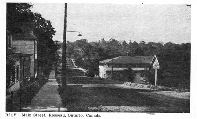 Main street of Rosseau (old Parry Sound Road / HWY 141) - Postcard - RV0031