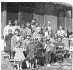 Stringer (Ramsbottom), Mary with a group of school children, Rosseau, 1959 - RP0508