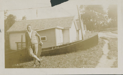 Boathouses and skiff at Chaffey's Locks