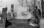 George Bass making maple syrup c.1925