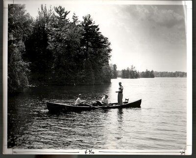 Ken Bedore guiding a fishing party 1944