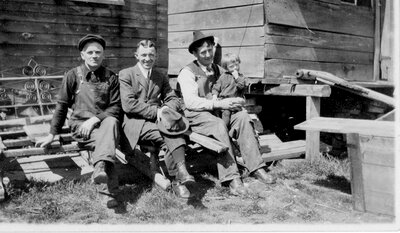 Charles Kerr (far left), Delbert Campbell, John Sullivan, unknown child c.1915