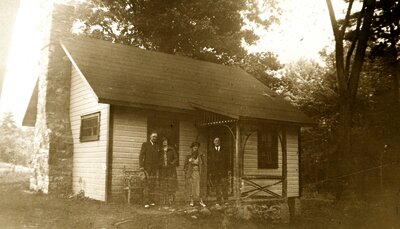 Group photo outside of house