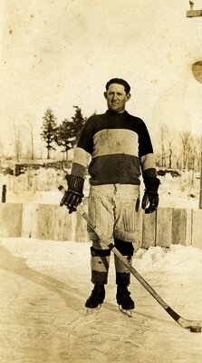 Fred Dougall playing hockey c.1930