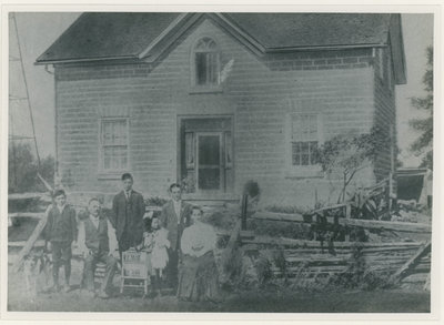 The John Chant family in front of the George Johnston House Harlem c.1909