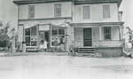 Marion DeWell in front of General Store