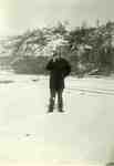 Some May weather at Michipicoten Harbour (Man standing in snow)  (photo: b&w)