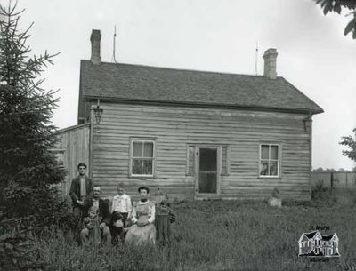 Family With Wood Frame Farmhouse, c. 1902-1906