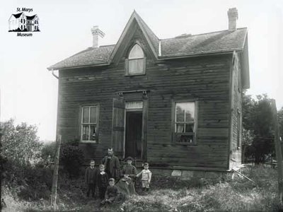 Rural Family in Front of Wood Frame House, c. 1902-1906