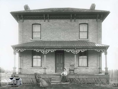 Women with Large Brick Home, c. 1902-1906