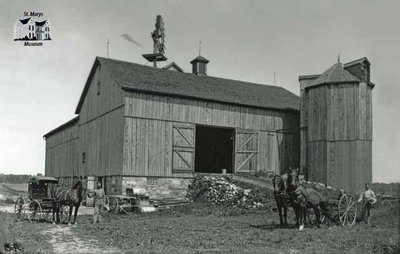 Tom and Bill McGee with their Barn, E. Nissouri, c. 1906