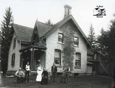 Rural Family with Brick House, c. 1902-1906