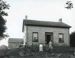 Farm Family with Brick House and Barns, c. 1902-1906