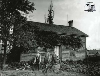 Group Portrait in Front of Farmhouse, c. 1902-1906