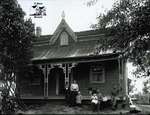 Family Portrait, Frame House with Ornate Front Porch, c. 1902-1906