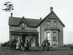 Rural Family with Brick Farmhouse, c. 1902-1906