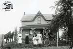 Large Family Portrait with Farmhouse, c. 1902-1906