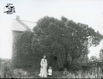 Woman and Child with Wooden Cottage, c. 1902-1906