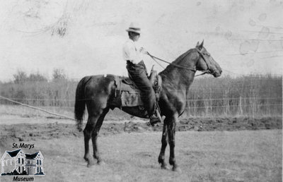 Man Riding a Horse