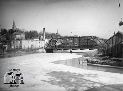 Water Street Bridge in Winter; Ice and People on Water