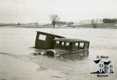 Two Cars in the River