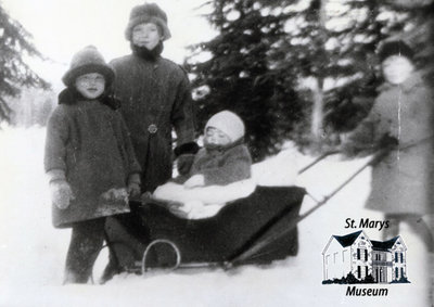 Woman and Children Outside in the Snow