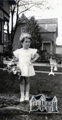 Young Girl Holding Flowers