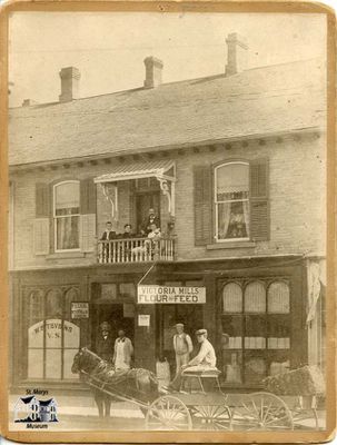 Stevens' Family Photo in Front of Veterinary Clinic