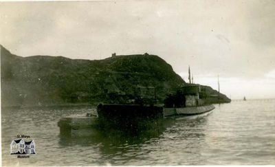 Ship in Front of Cliffs