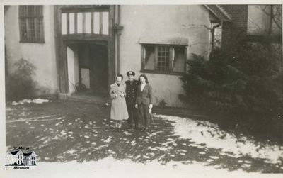 Sub Lieutenant Richard A. Simon Accompanied by Two Women