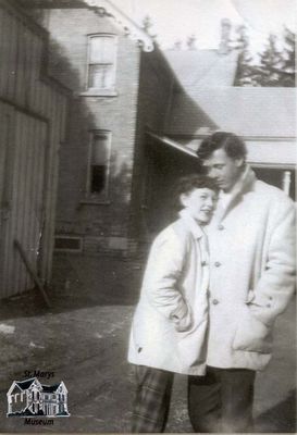 Jack and 'Tiny' Wood in Front of Their House