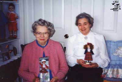 Holding Dolls at Friendship Centre Event