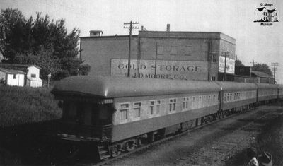 Passenger Train Near Cold Storage Plant