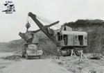 Electric Shovel and Dump Truck in Old Quarry
