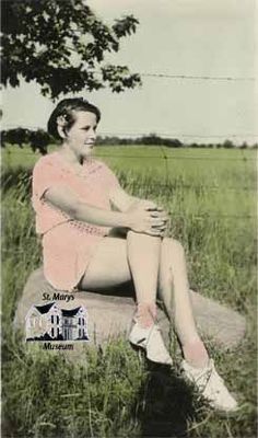 Dorothy Markle Sitting on a Rock