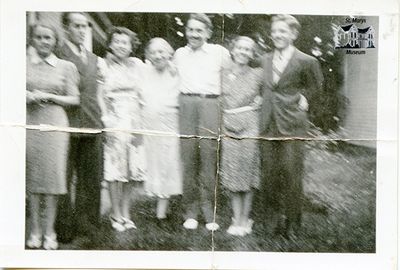 Chesterfield Family Outside Their Family Home