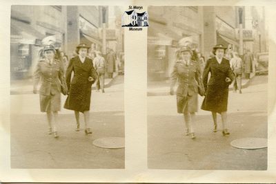 Isabelle Chesterfield and Another Women Walking on Street